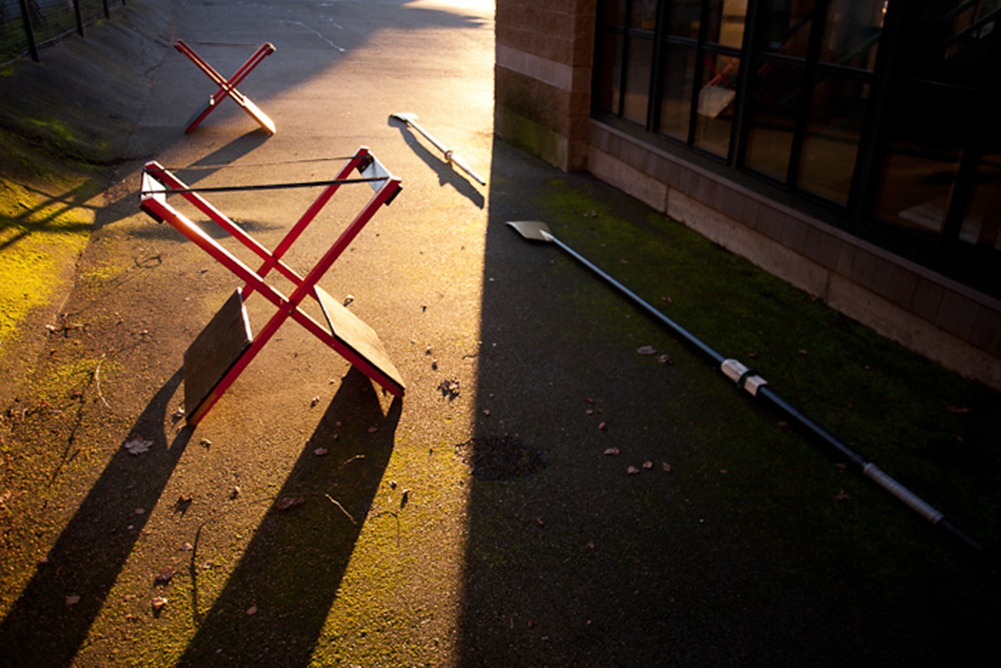 Shell stands and oars lie outside in the morning sun at the Lake Washington Rowing Club in Seattle on Friday, Feb. 3, 2012. Founded in 1957, the not-for-profit club offers a range of classes from introductory lessons to member-specific programs. (Photo/Neil Enns)