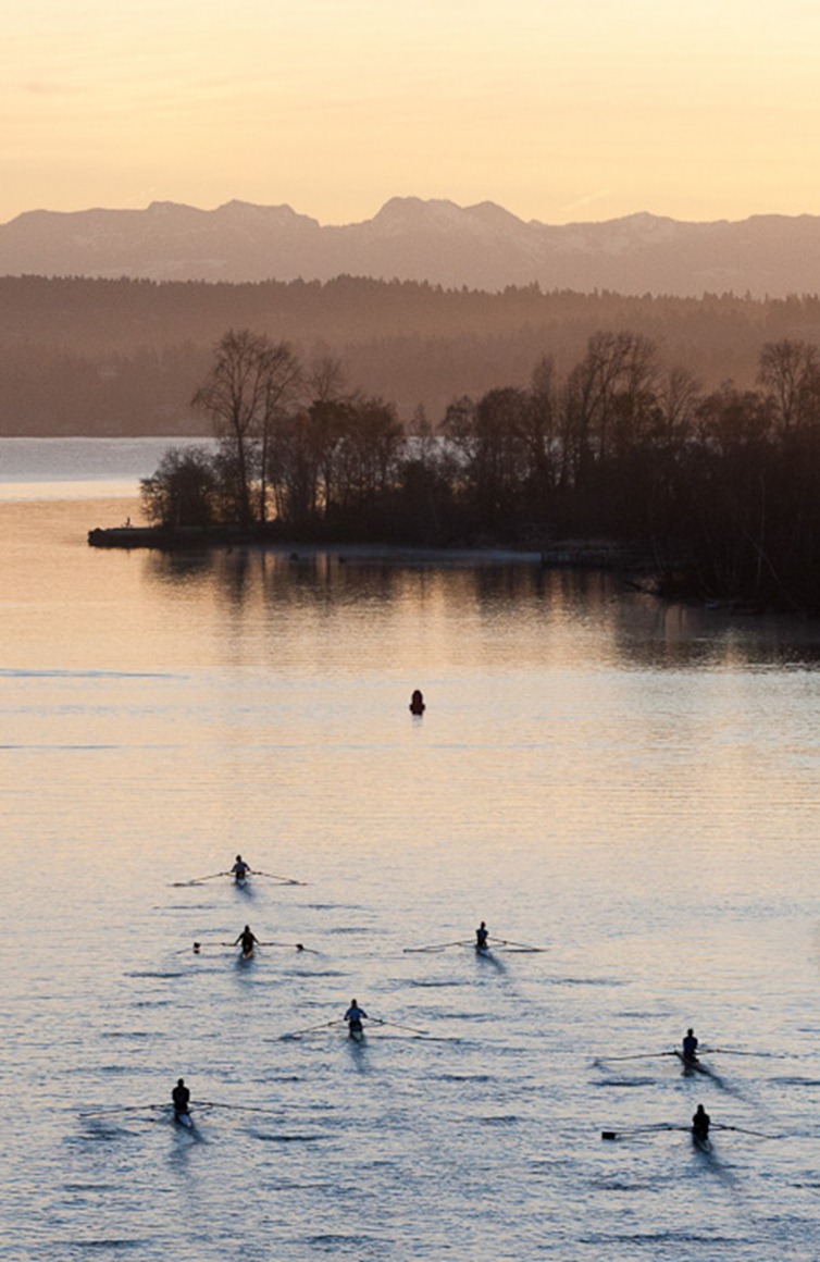 A group of rowers head towards Lake Washington in Seattle on Monday, Feb. 6, 2012. (Photo/Neil Enns)
